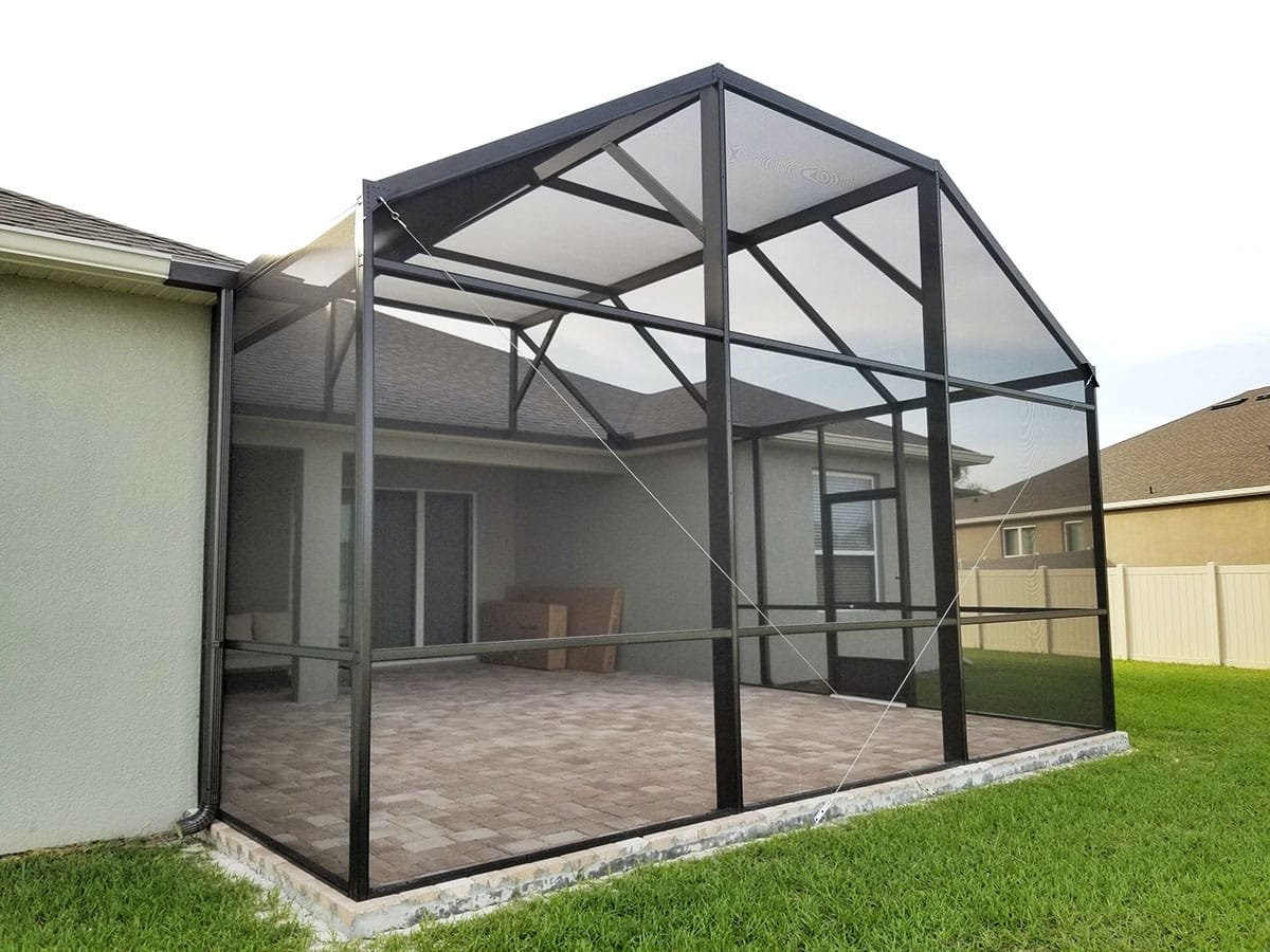 Aluminum lanai screen enclosure installation in St. Augustine, FL attached to residential home